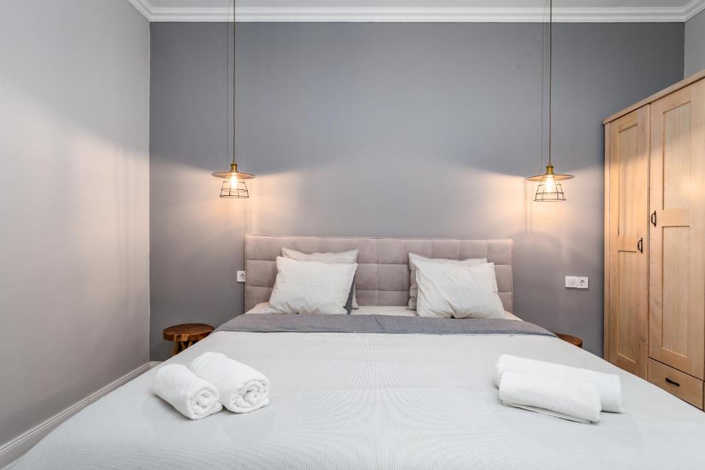 Postel nebo postele na pokoji v ubytování Karolina apartment #2