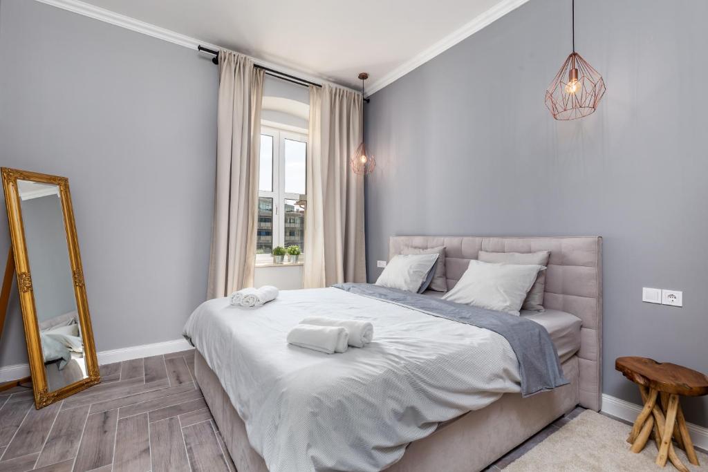 Postel nebo postele na pokoji v ubytování Karolina apartment #2