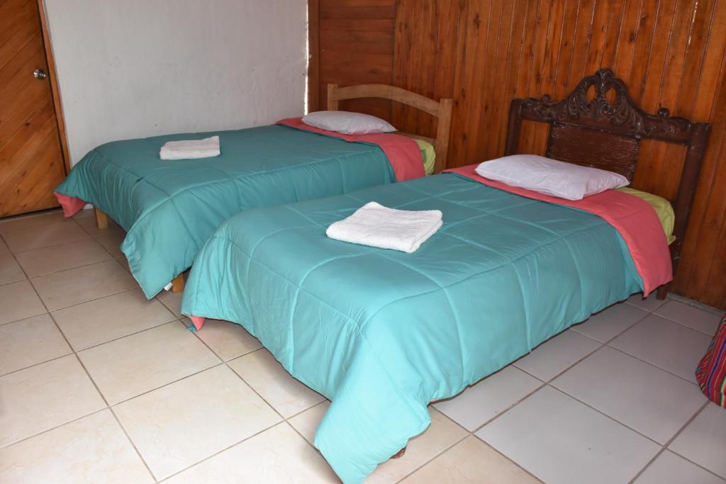 Postel nebo postele na pokoji v ubytování Oasis Paraiso Ecolodge