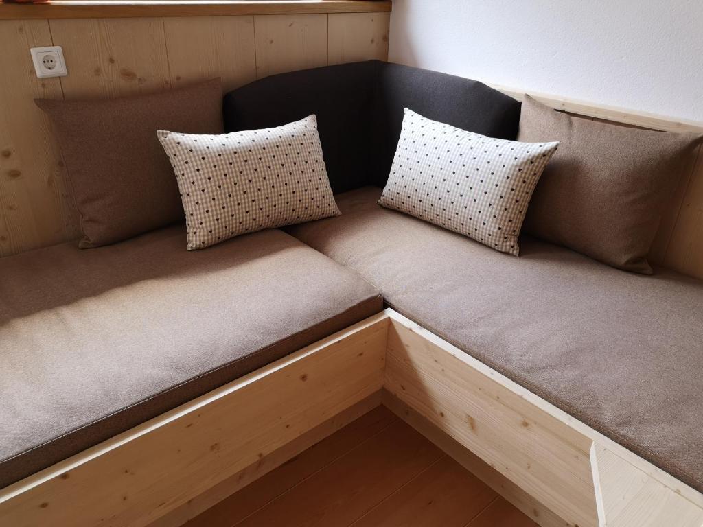 Łóżko lub łóżka w pokoju w obiekcie Aussermairhof
