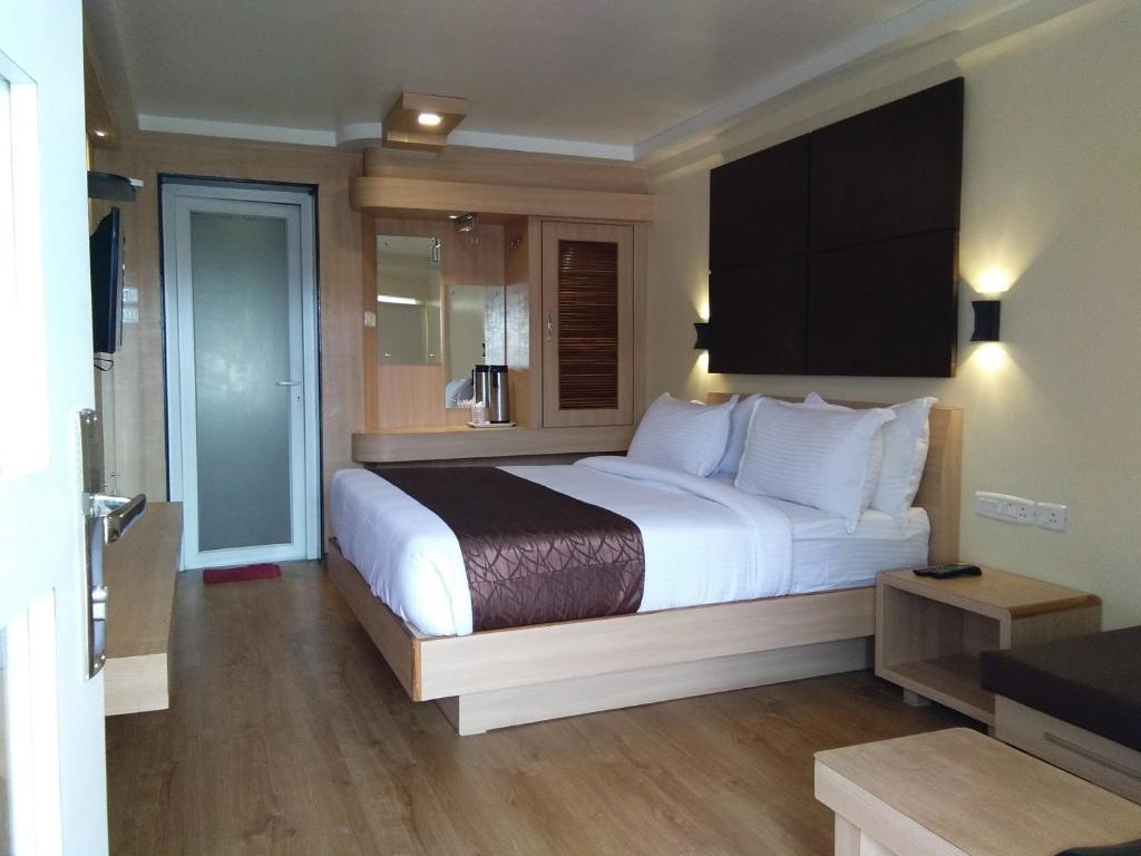 Postel nebo postele na pokoji v ubytování Darshan Resorts Pvt ltd