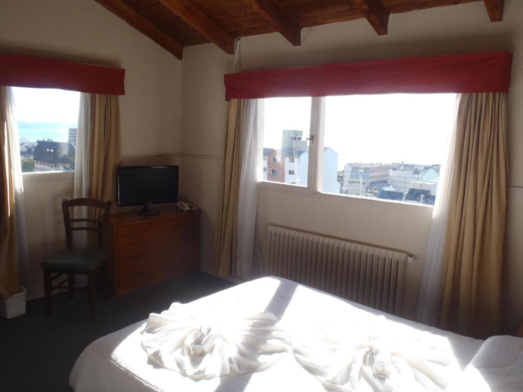 Postel nebo postele na pokoji v ubytování Hotel Cottbus