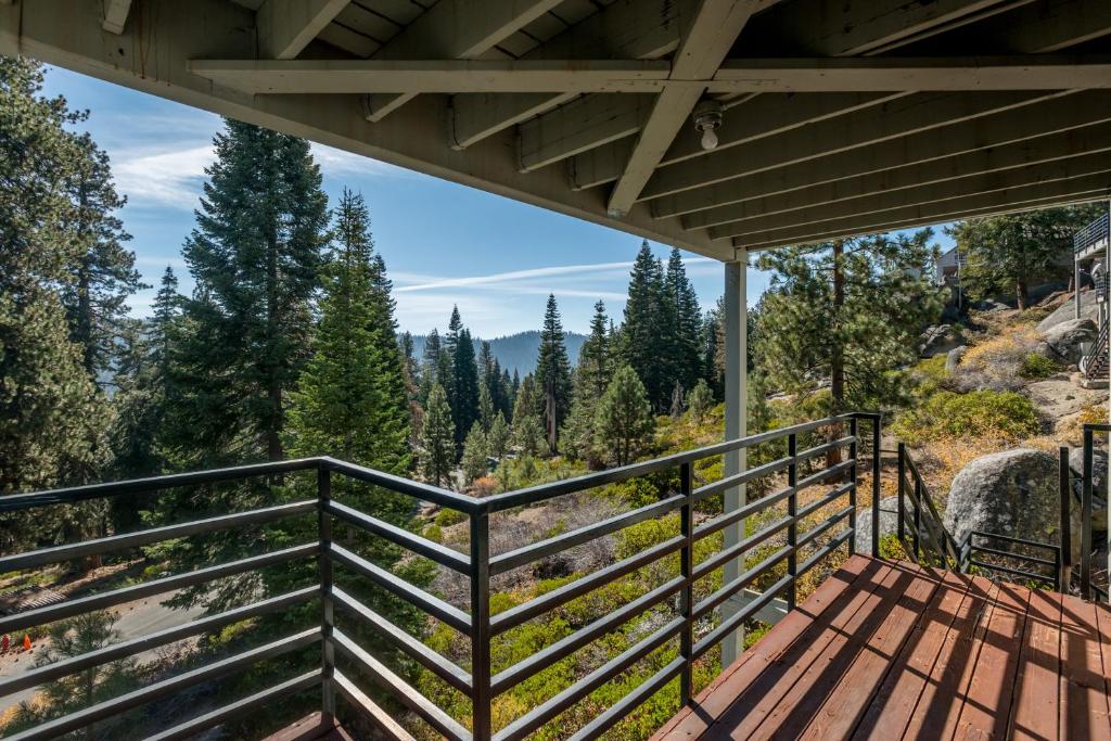 a balcony with a view of the mountains at Eagle's Landing Condo 71 in Lakeshore