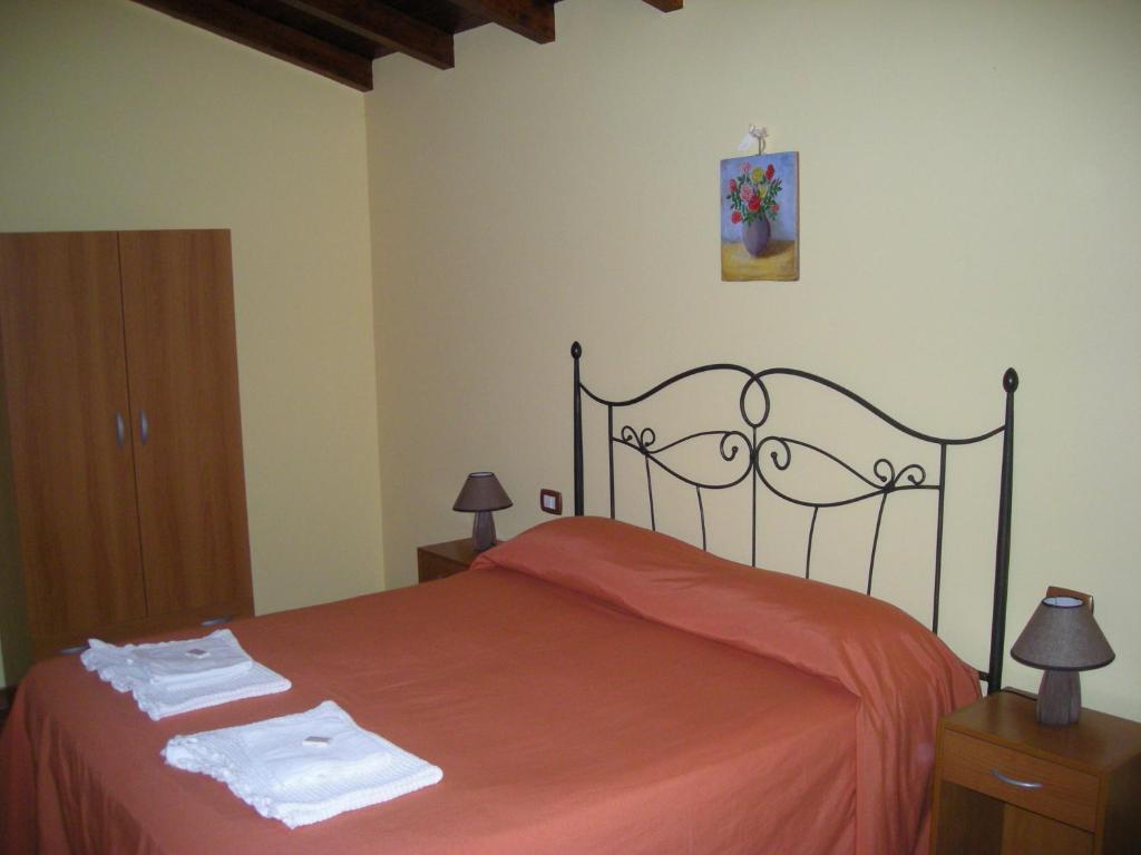 Postel nebo postele na pokoji v ubytování B&B Le Dune Beach