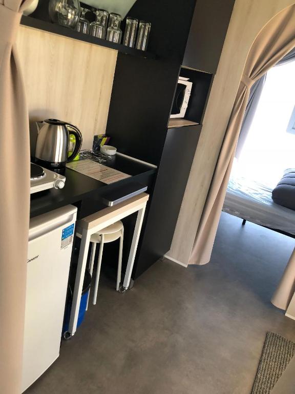 Kuchyň nebo kuchyňský kout v ubytování Camping Fleur d'Oleron