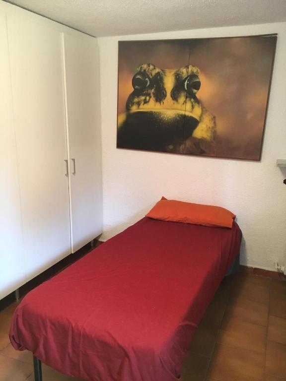 Łóżko lub łóżka w pokoju w obiekcie Taverna tranquillissima indipendente