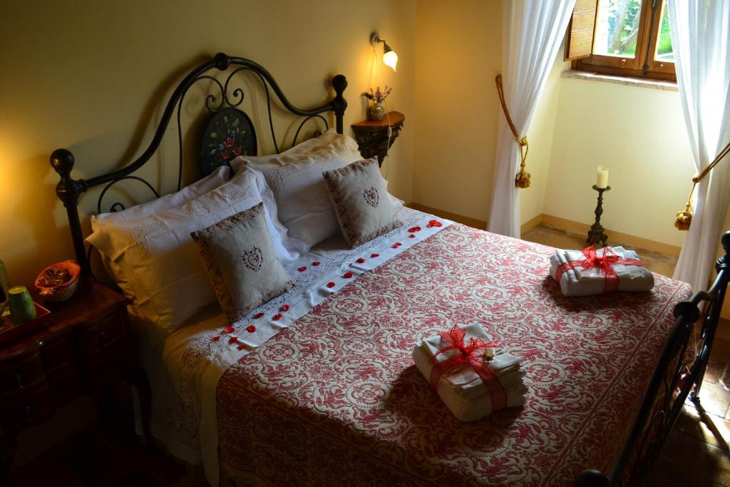 Postel nebo postele na pokoji v ubytování B&B Palazzo La Loggia