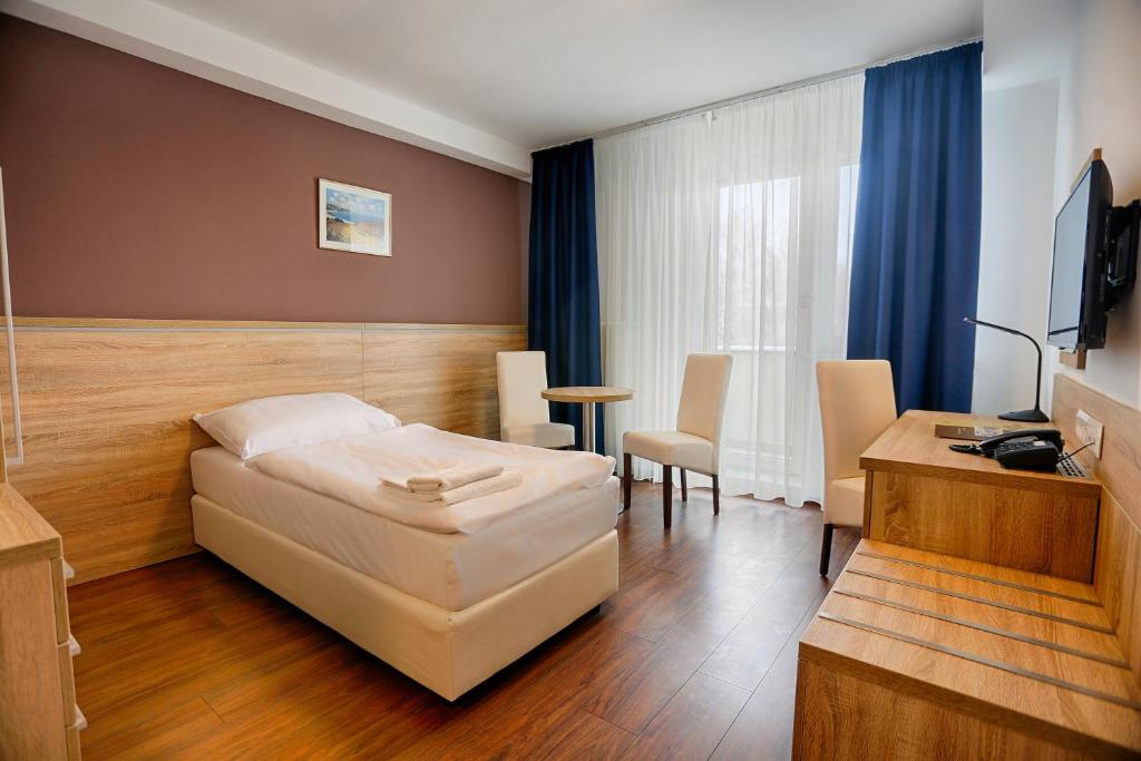 TV a/nebo společenská místnost v ubytování Ensana Spa Smrdáky