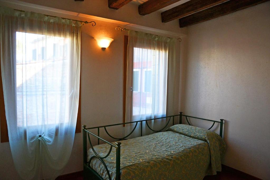 Postel nebo postele na pokoji v ubytování Oceano Mare B&B