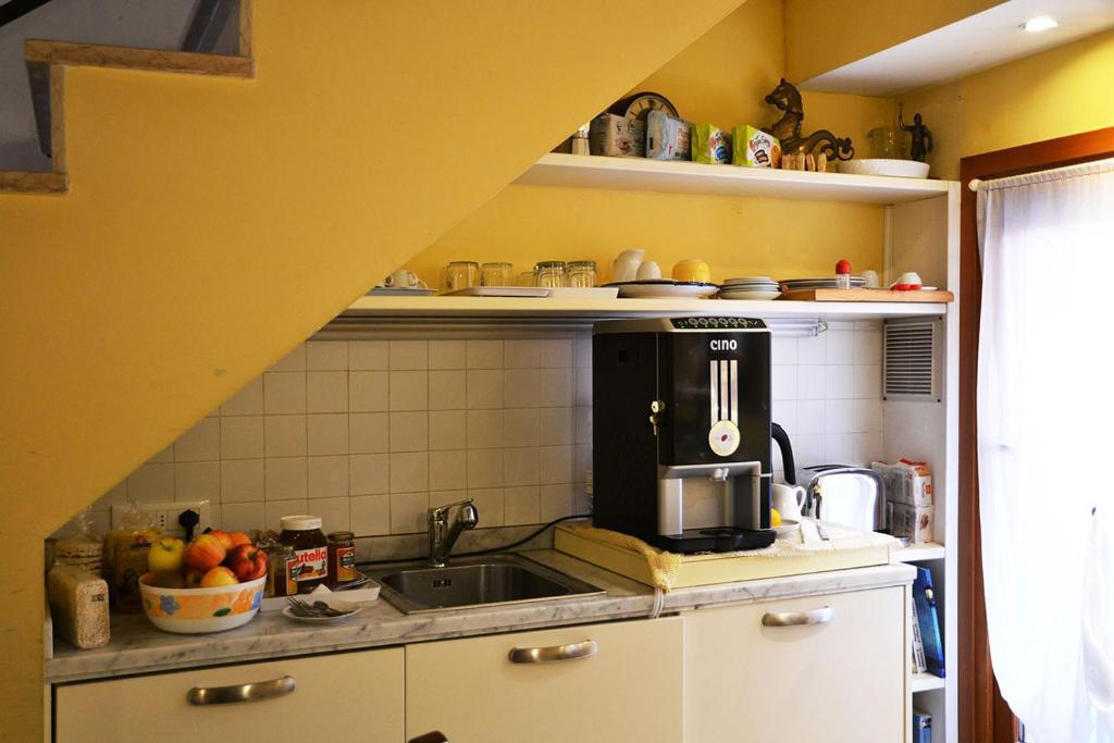 Kuchyň nebo kuchyňský kout v ubytování Oceano Mare B&B