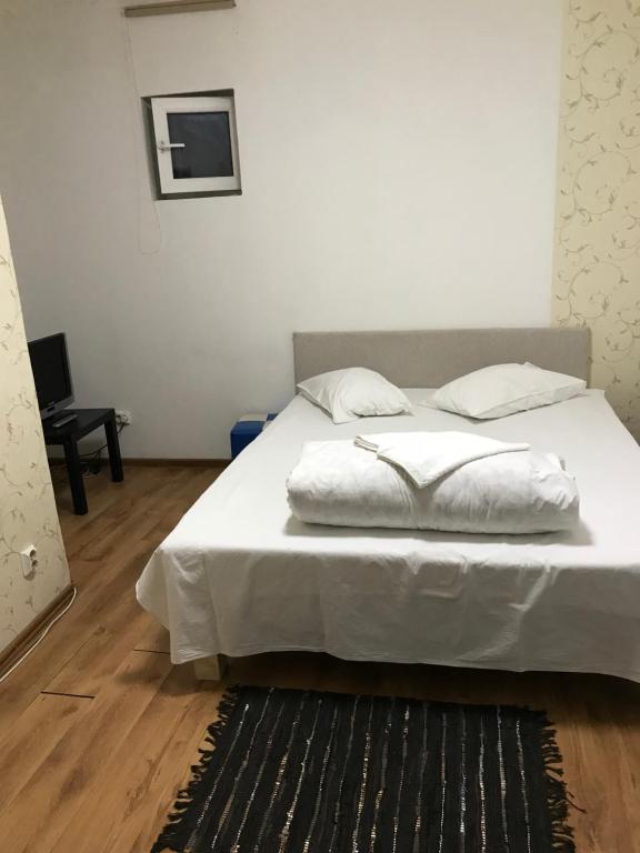 Ένα ή περισσότερα κρεβάτια σε δωμάτιο στο La Anca Hotel