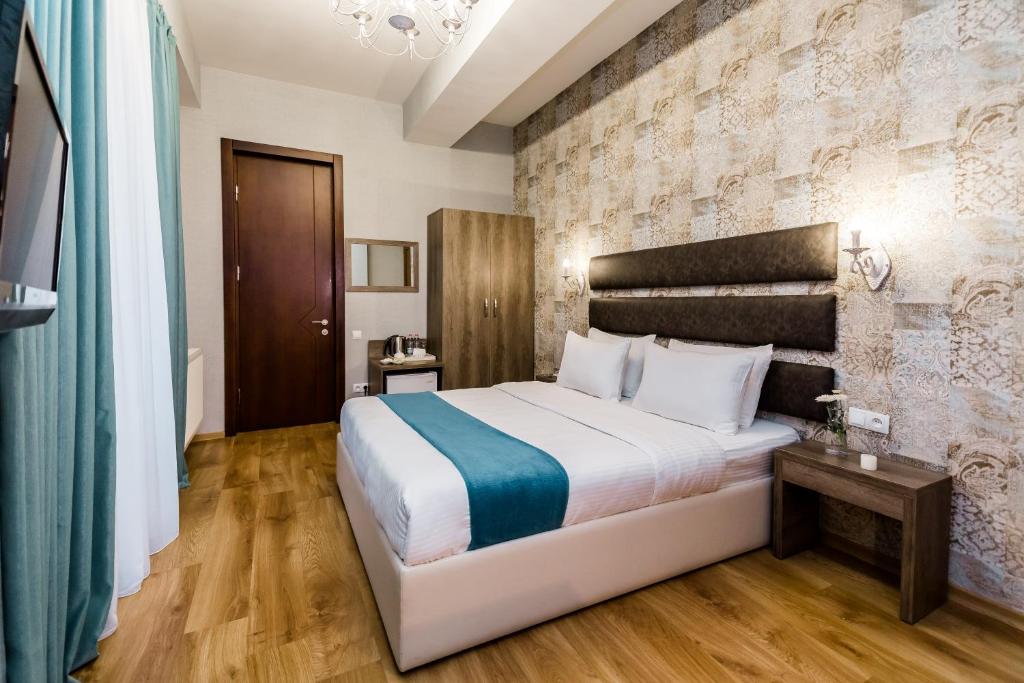 Postel nebo postele na pokoji v ubytování Hotel Diamond