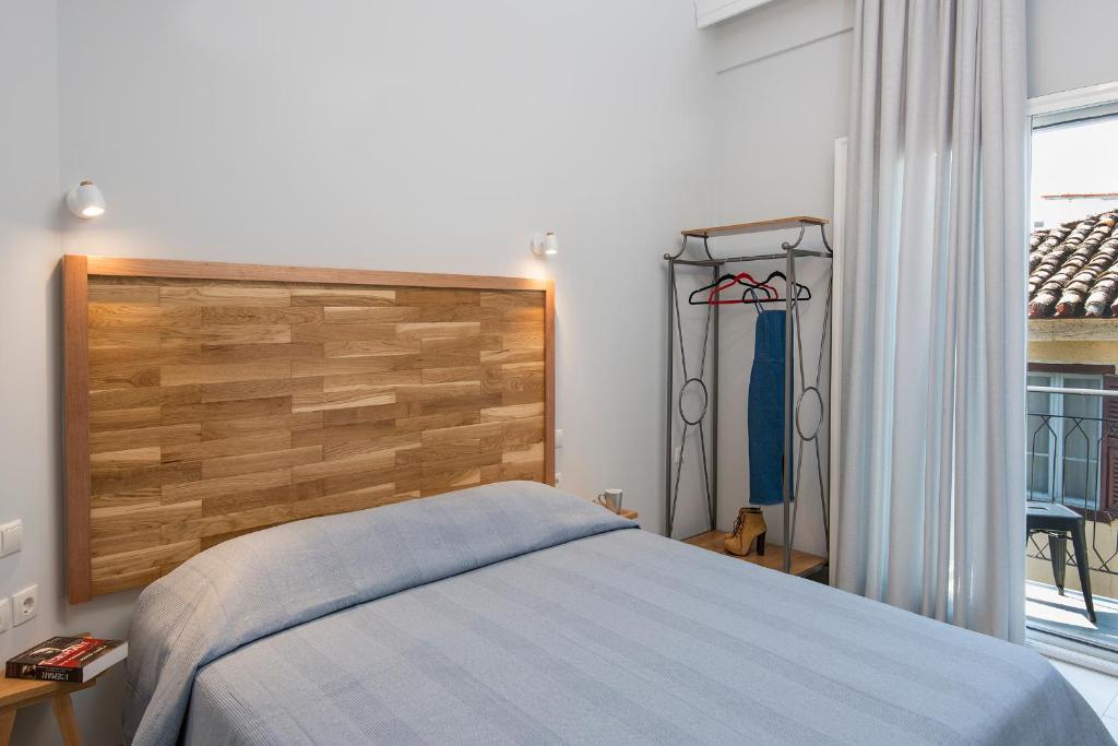 Posteľ alebo postele v izbe v ubytovaní DownTown Hotel