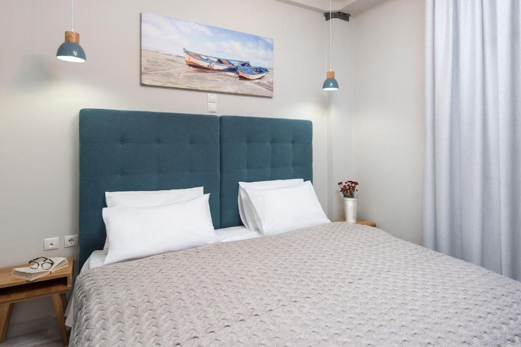 Posteľ alebo postele v izbe v ubytovaní DownTown Hotel