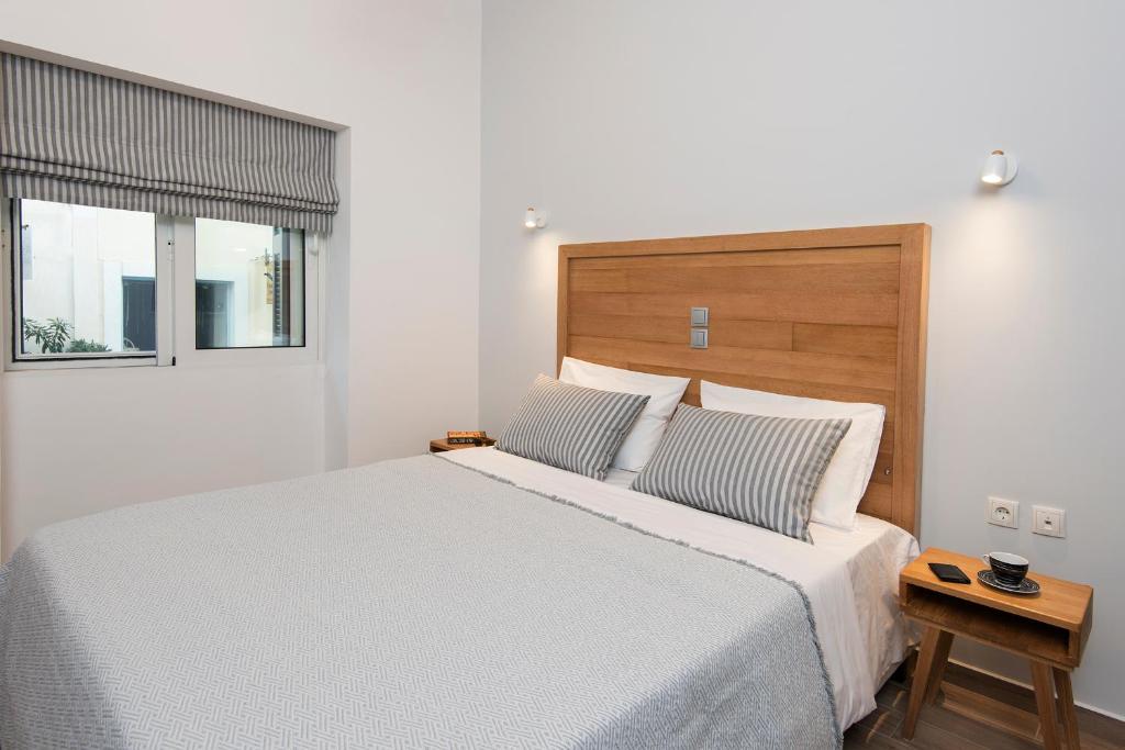 Posteľ alebo postele v izbe v ubytovaní DownTown Hotel