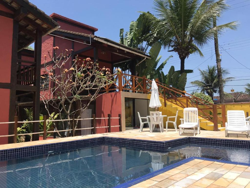 A piscina localizada em Pousada Vila do Sol Juquehy ou nos arredores