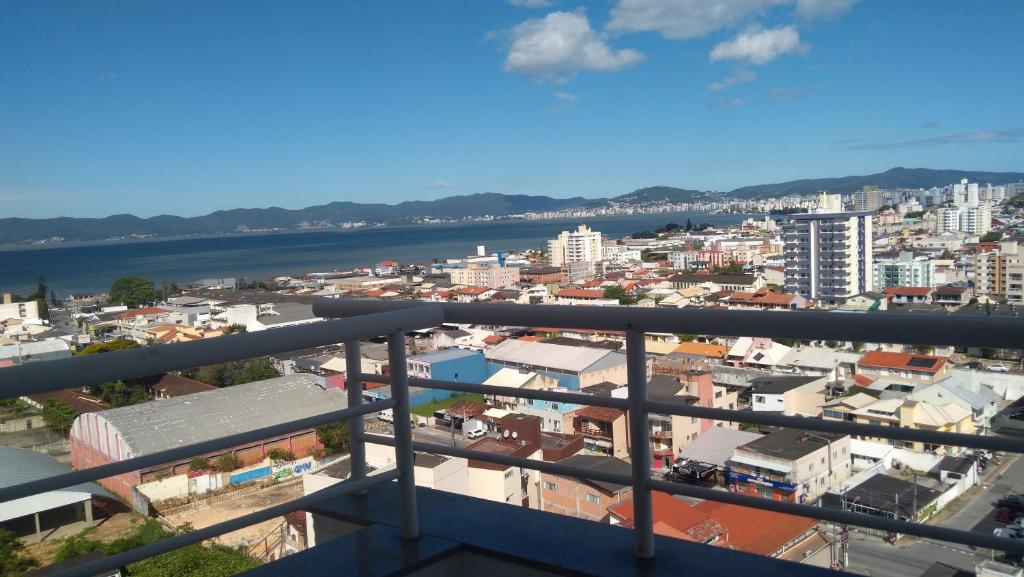 a view of a city from a balcony at Ap em São José com linda vista para o mar in São José