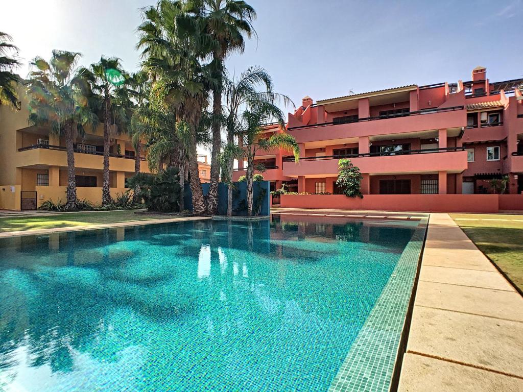 a swimming pool in front of a building at Arona 2 - 0909 in Mar de Cristal