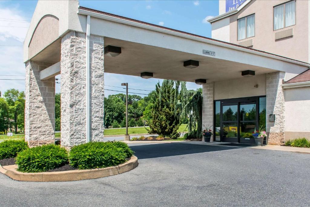 a lobby of a building with a glass door at Sleep Inn & Suites Mountville in Mountville