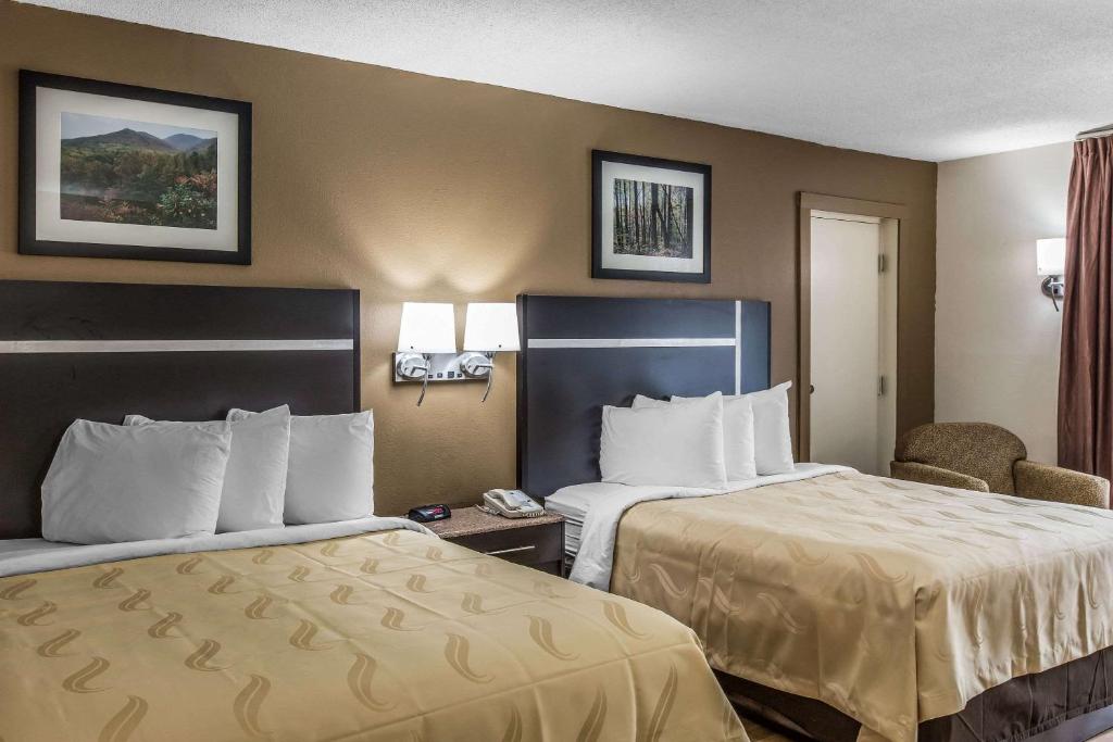Кровать или кровати в номере Quality Inn & Suites
