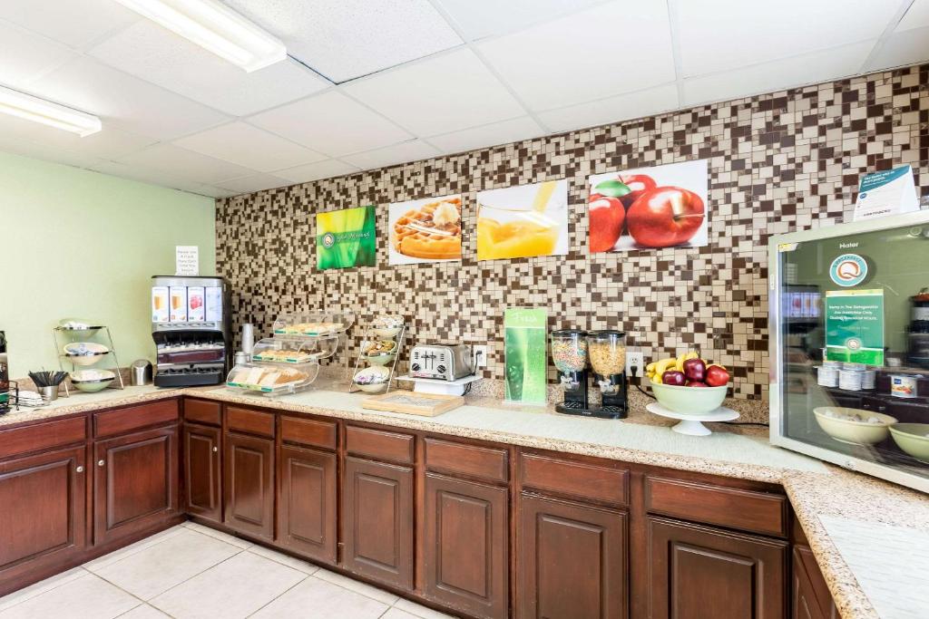 a kitchen with a counter in a store at Quality Inn Near Seaworld - Lackland in San Antonio