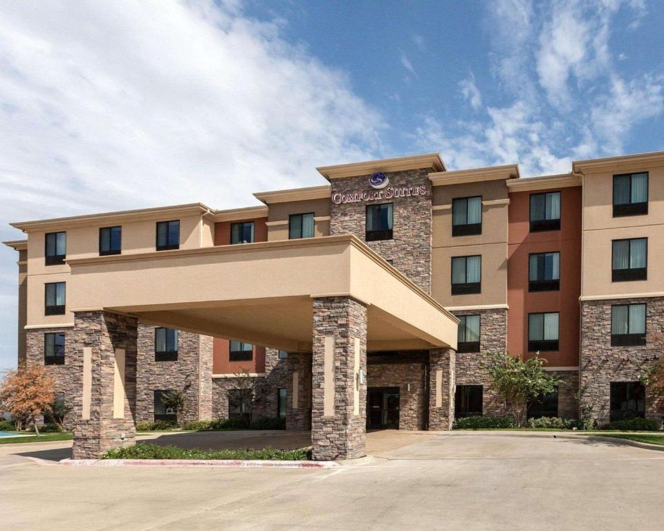 a rendering of a hotel with a building at Comfort Suites Greenville in Greenville
