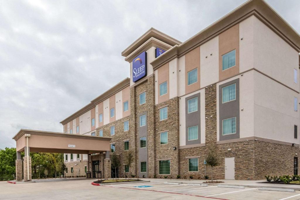 eine Darstellung der Vorderseite eines Hotels in der Unterkunft Sleep Inn & Suites College Station near University in College Station