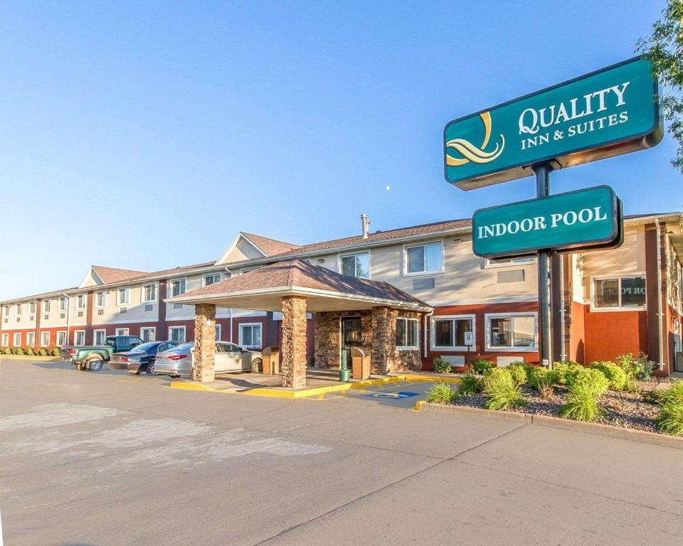 a hotel with a sign for an indoor pool at Quality Inn & Suites in Eau Claire