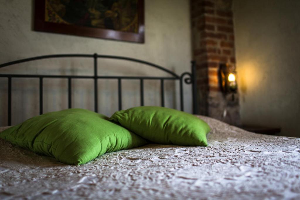 Postel nebo postele na pokoji v ubytování Agriturismo Borg da Ocjs