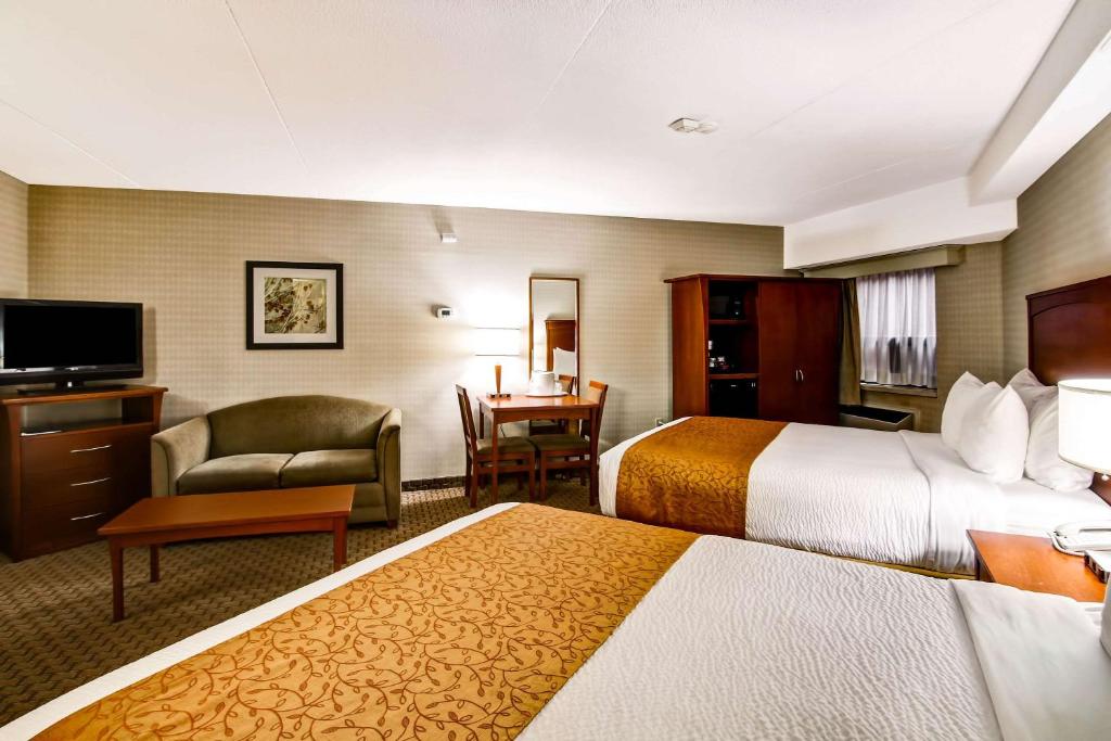 Postel nebo postele na pokoji v ubytování Quality Inn