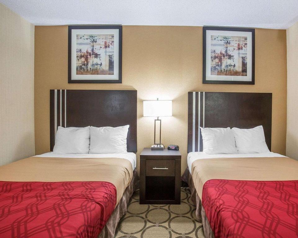 Vuode tai vuoteita majoituspaikassa Econo Lodge