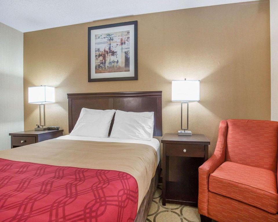 Vuode tai vuoteita majoituspaikassa Econo Lodge