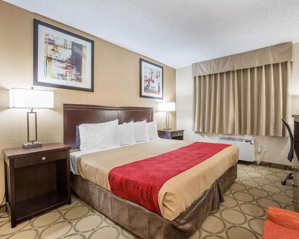 Vuode tai vuoteita majoituspaikassa Econo Lodge