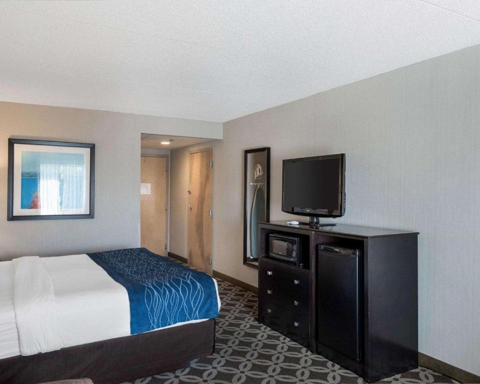 Postel nebo postele na pokoji v ubytování Comfort Inn Rehoboth Beach