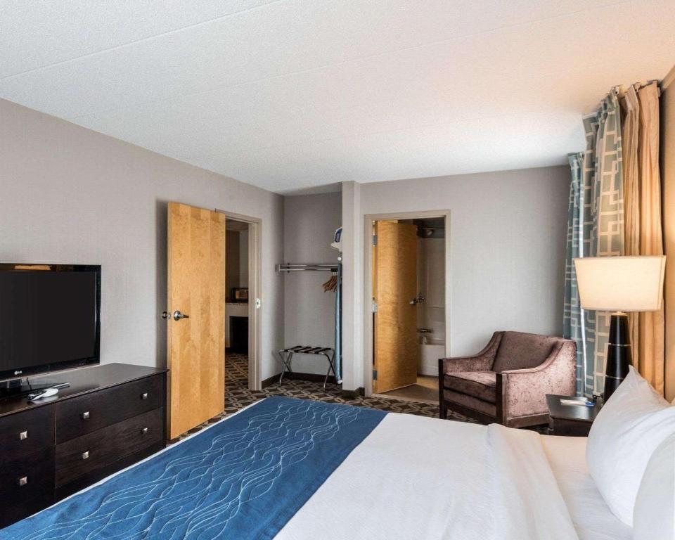 Postel nebo postele na pokoji v ubytování Comfort Inn Rehoboth Beach