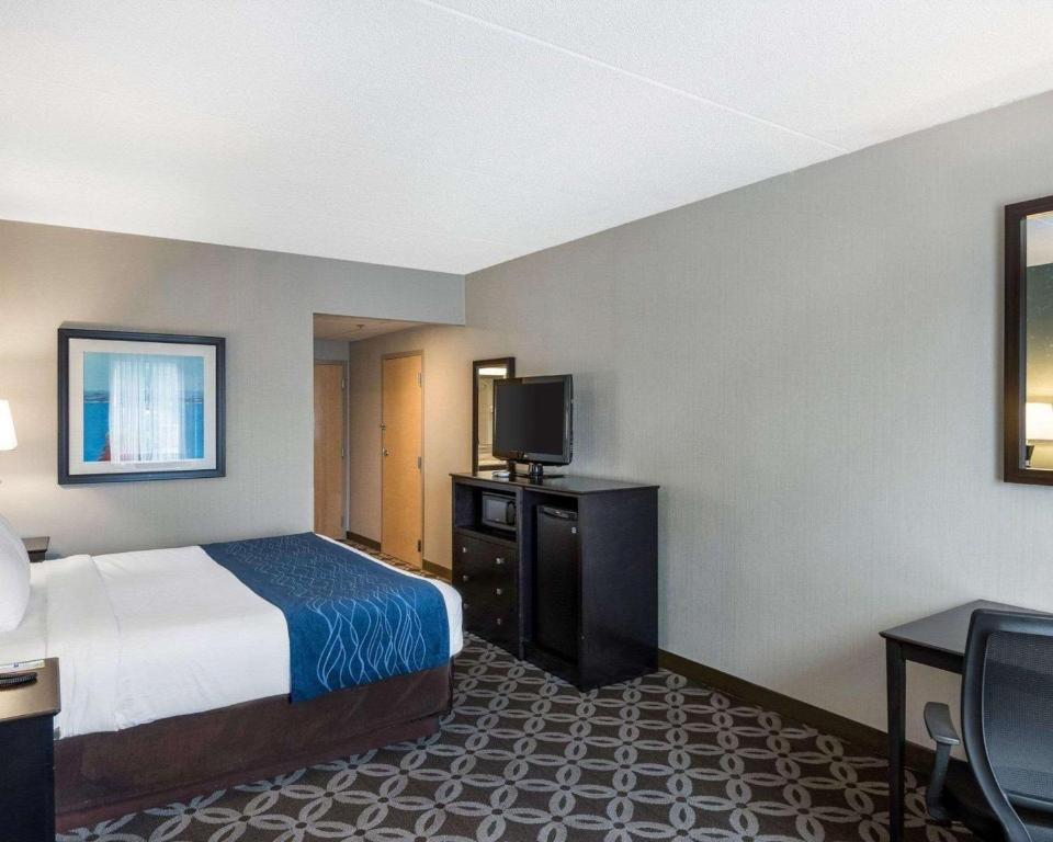 Postel nebo postele na pokoji v ubytování Comfort Inn Rehoboth Beach