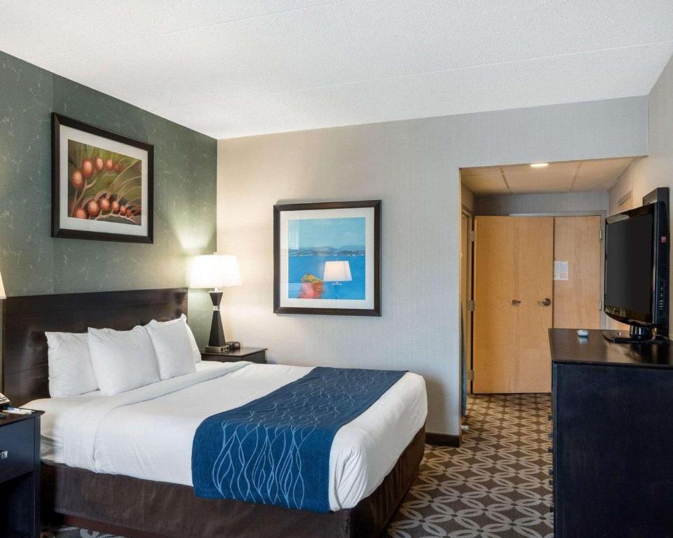 Postel nebo postele na pokoji v ubytování Comfort Inn Rehoboth Beach