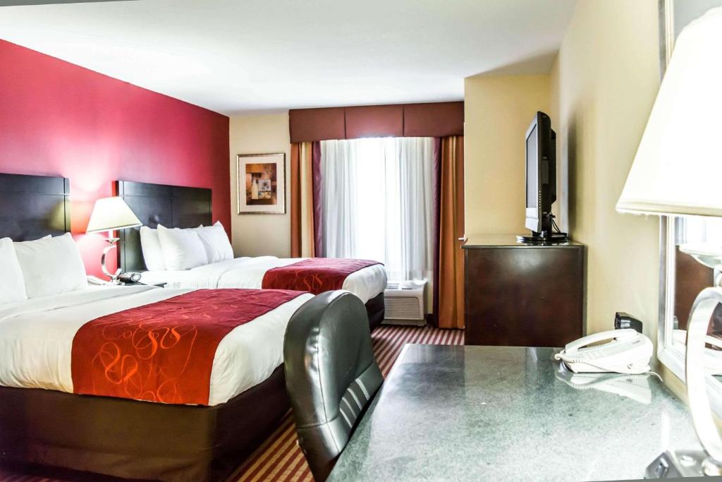 Postel nebo postele na pokoji v ubytování Comfort Suites Palm Bay - Melbourne