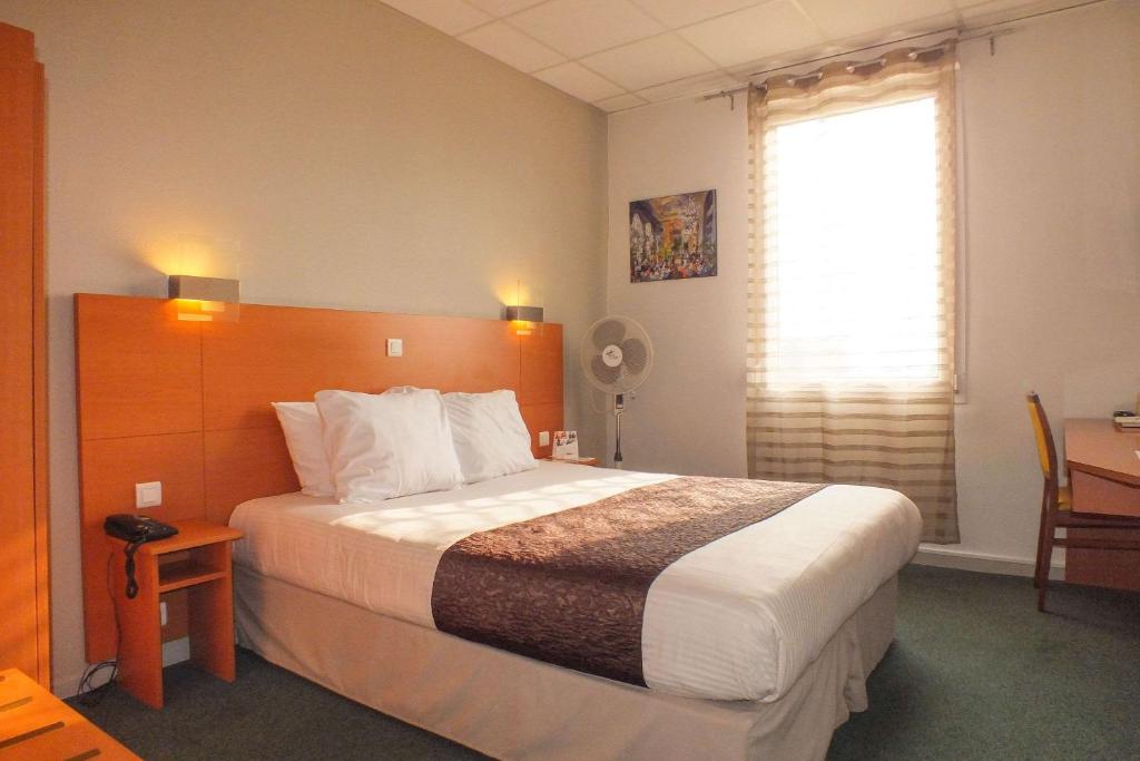 Postel nebo postele na pokoji v ubytování Hotel Cecil Metz Gare