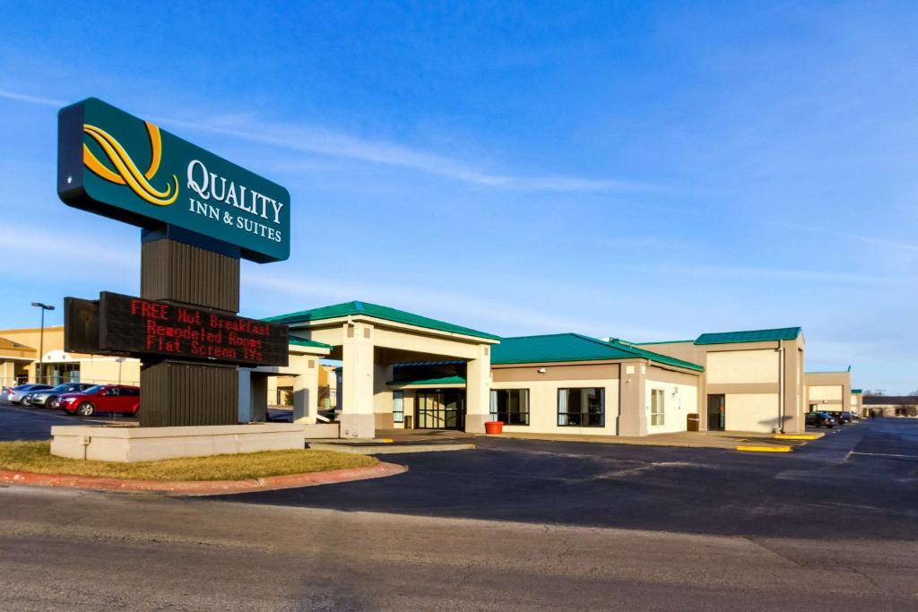 a building with a sign in front of it at Quality Inn & Suites Moline - Quad Cities in Moline