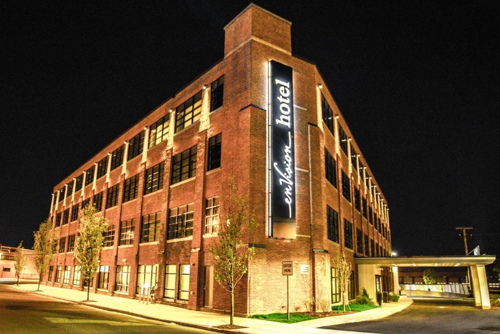 a brick building with a sign on the side of it at enVision Hotel Boston-Everett in Boston