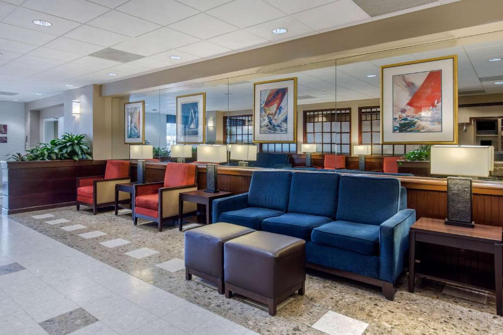a lobby with chairs and a waiting room at Comfort Inn Conference Center Bowie in Bowie