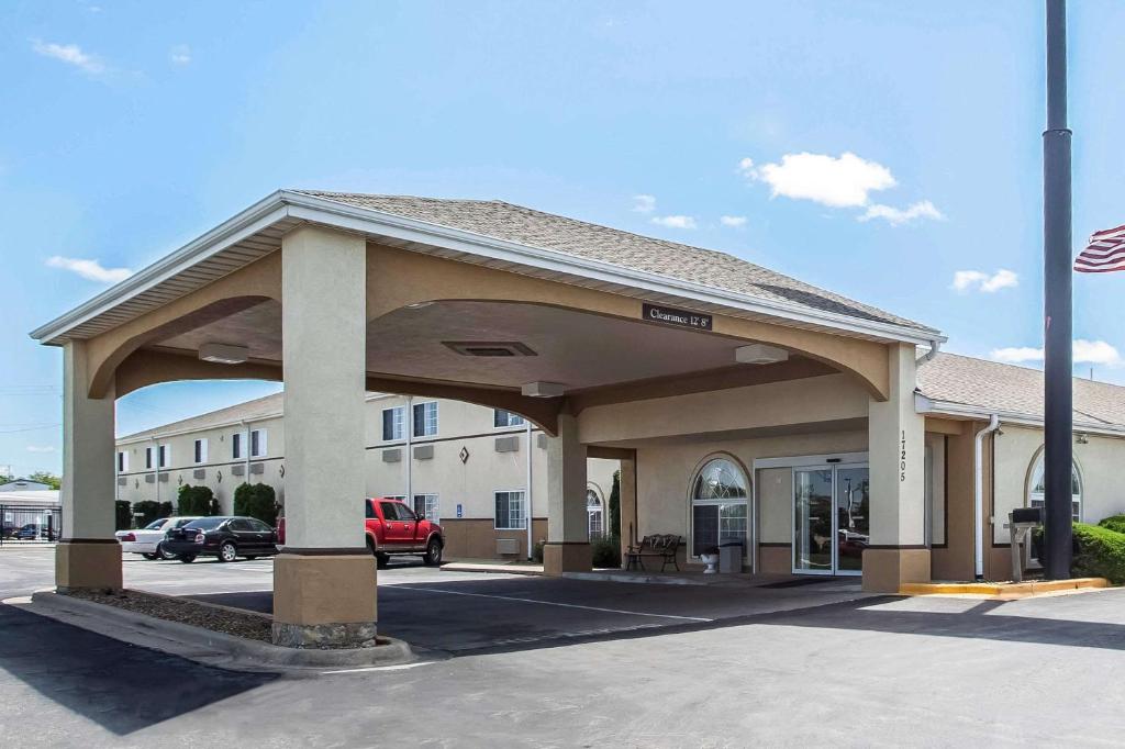 a large building with a parking lot in front of it at Quality Inn Belton in Belton