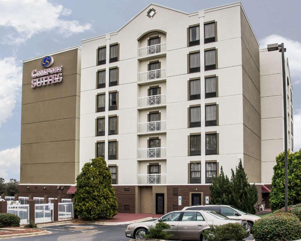 a rendering of the front of a hotel at Comfort Suites Research Park - University in Charlotte