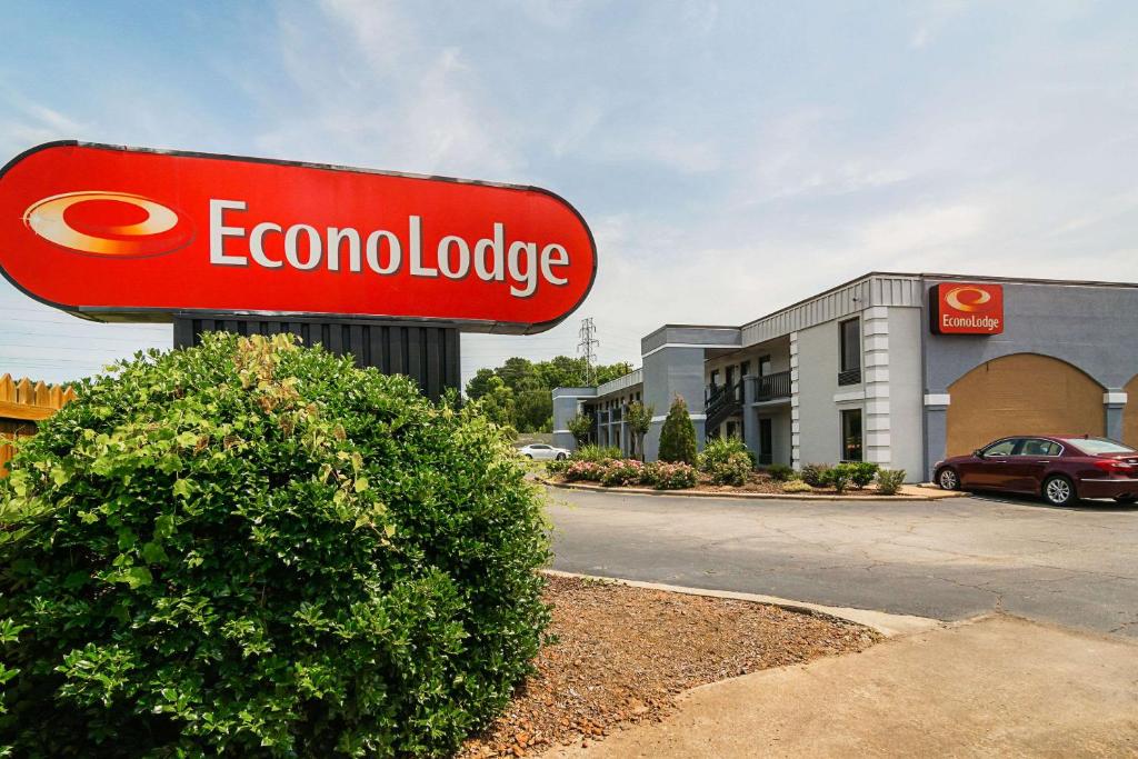 a sign in front of a store at Econo Lodge Research Triangle Park in Durham