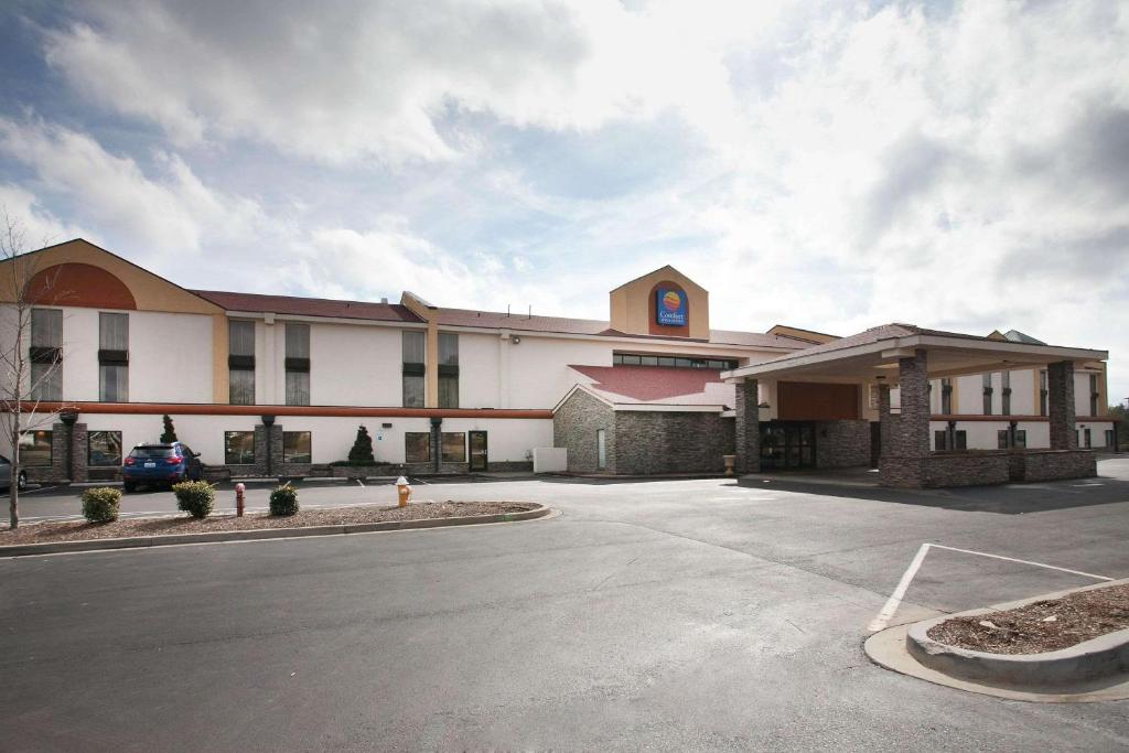 a large building with a parking lot in front of it at Comfort Inn & Suites Statesville - Mooresville in Statesville
