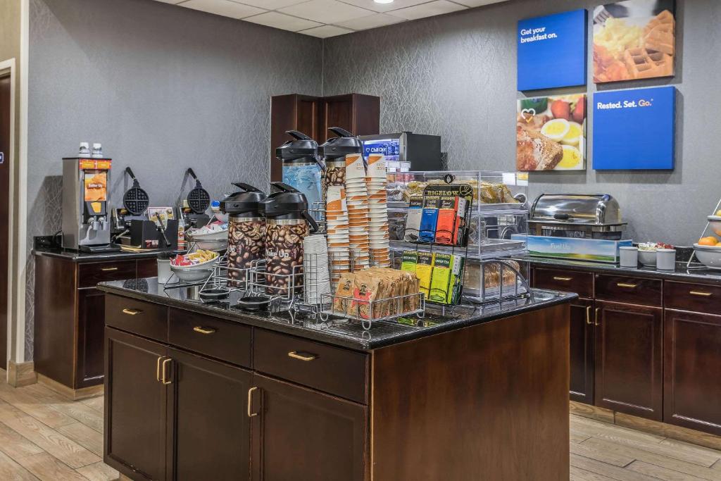 a buffet line with food on top of it at Comfort Inn SW Omaha I-80 in Omaha