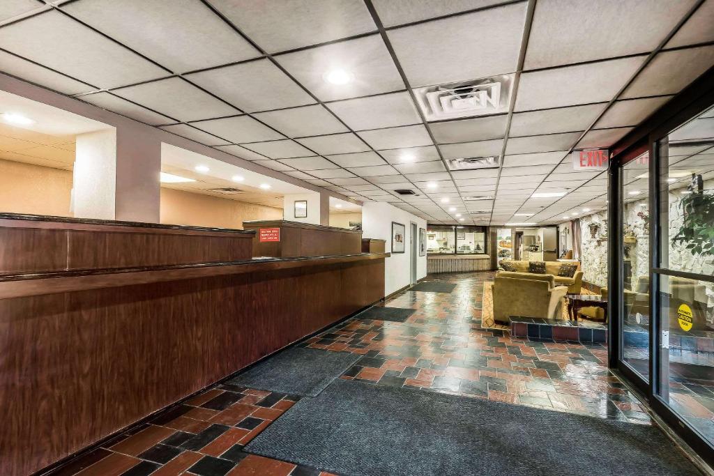 a lobby of a hospital with a waiting room at Quality Inn & Suites Binghamton Vestal in Binghamton