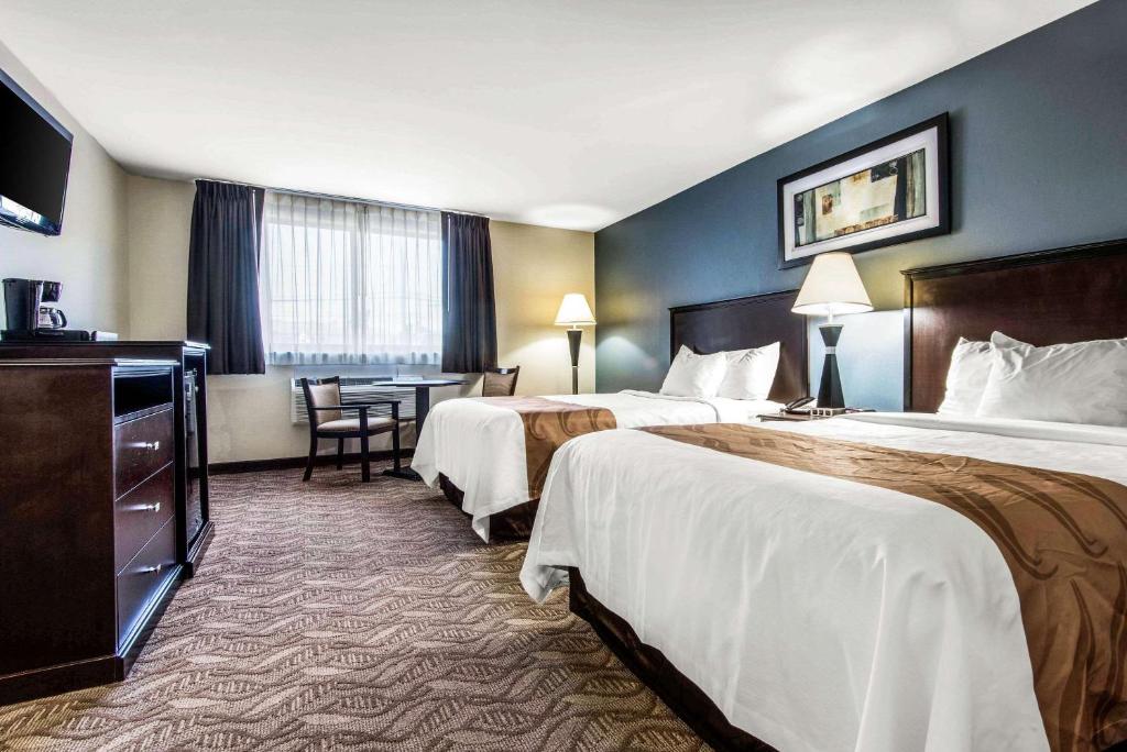 Letto o letti in una camera di Quality Inn - Niagara Falls Blvd