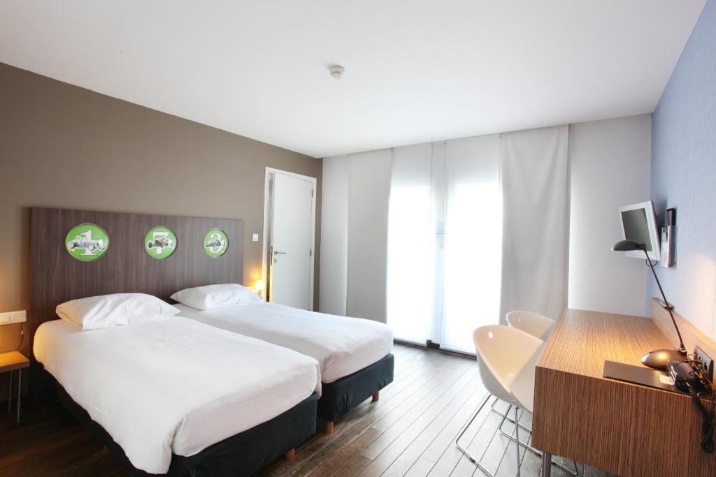 Postel nebo postele na pokoji v ubytování Hotel De Pits